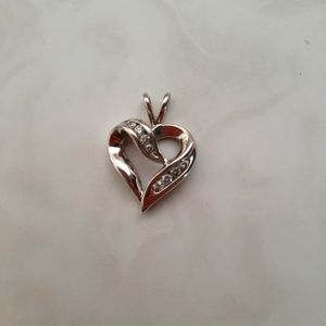 Zales 1/4ct 10k white gold diamond cross heart pendant